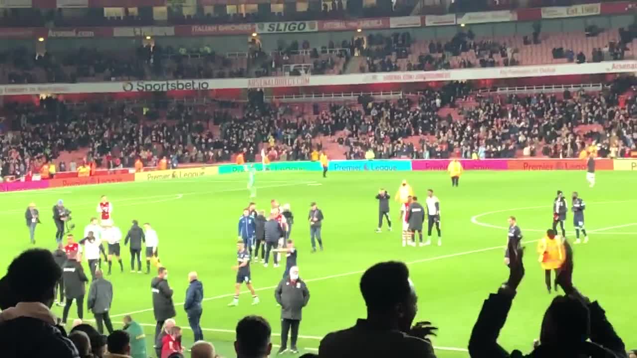 Gunners fans storm the field after beating hammers