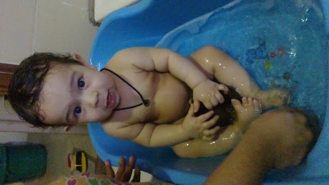 bathing baby boy