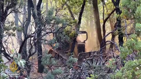 Wildfires ravage US and Canada prompting more evacuations, warnings