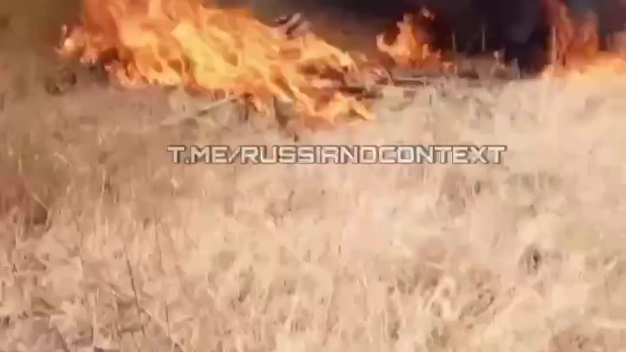 Russians Trying to Drive a Self-Propelled Heavy Gun Engulfed in Flames After Multiple Drone Strikes