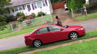 Woman is Up to Her Waist in Windshield