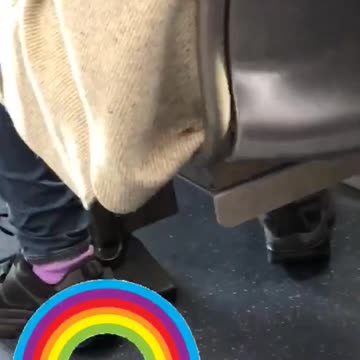 Woman white brown sweater has roach on her