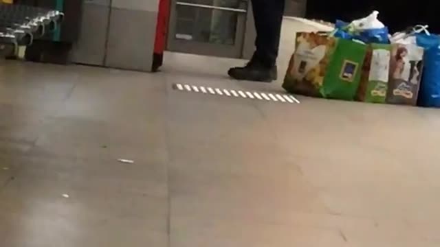 Old man tackles machine in subway station