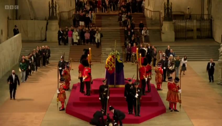 the new normal : Royal guard at the Queen's coffin has collapsed.