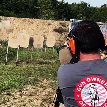 Pistol Shooting at 2-Gun Competition