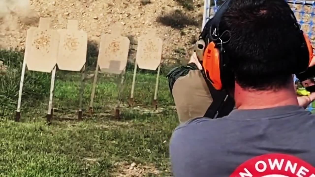 Pistol Shooting at 2-Gun Competition