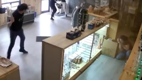 Employee uses glass bong to stop thieves robbing store