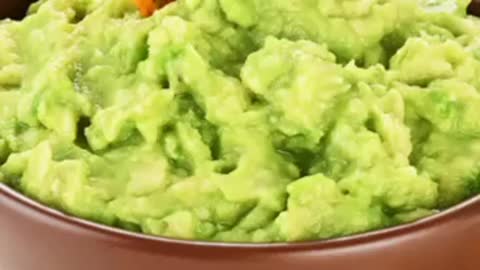 Dip the chip in the guacamole dip avacado officionado