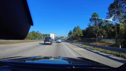 BMW driver cuts off car behind me , then me. We honk. He goes nuts!