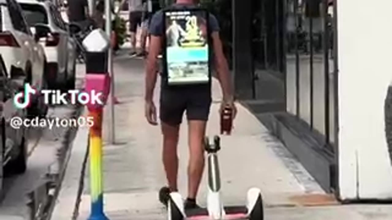 A Walking Billboard and a stalking Segway.