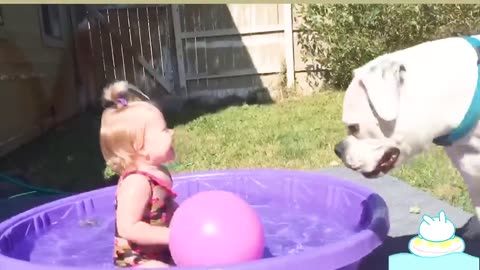 Funny baby playing with water