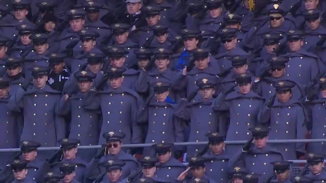 President Donald Trump salutes as the National Anthem is performed at the Army