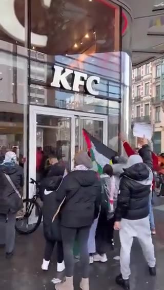 Catch Up - Protesters amass at KFC. Unclear what KFC has to do with anything.