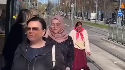 Female immigrants throw shit at each other in the street