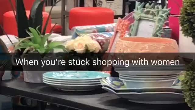 Man stuck shopping with women