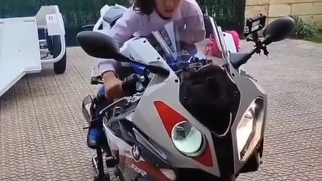 Cute little girl smart biker