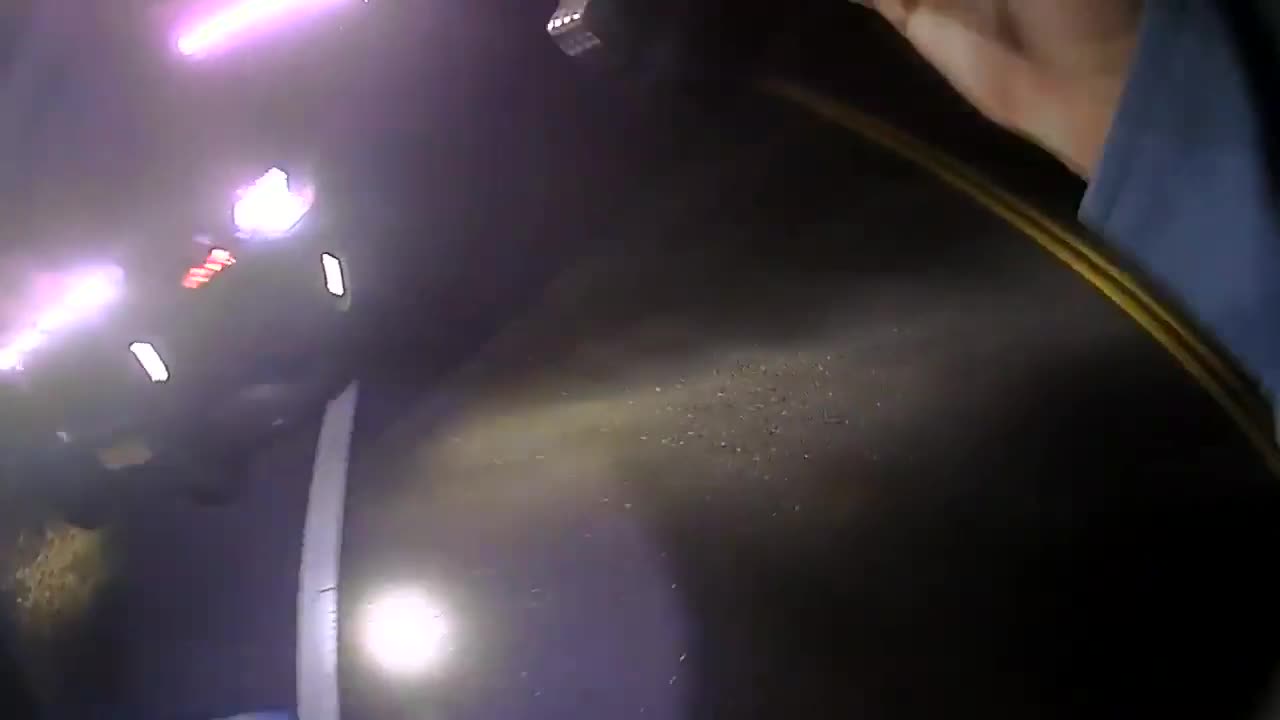 Body Camera Shows Rookie Police Officer Saving Man from Burning Car