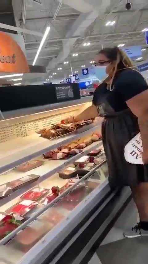 Vegans paying homage to the fallen at the meat counter.