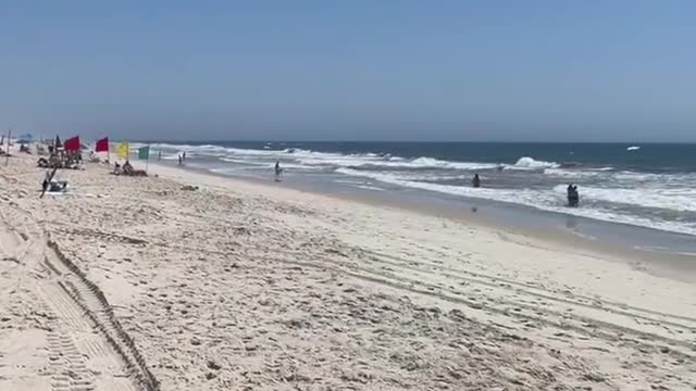 Lots of people on the beach in summer