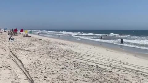 Lots of people on the beach in summer