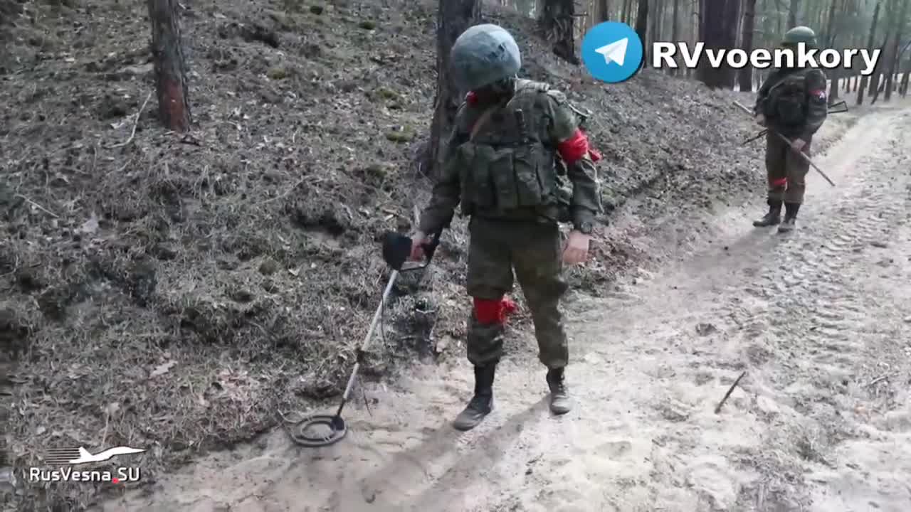 Russian soldiers check forest, roads and civilian facilities for mines.