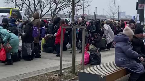 Queue for evacuation trains to Poland at the railway station in Lvov
