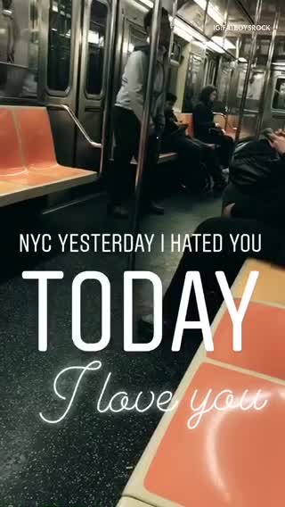 Guy in grey jacket dances near subway doors