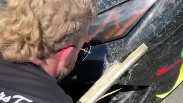 Piece of Wood breaks the Lamborghini and stuck below the headlight