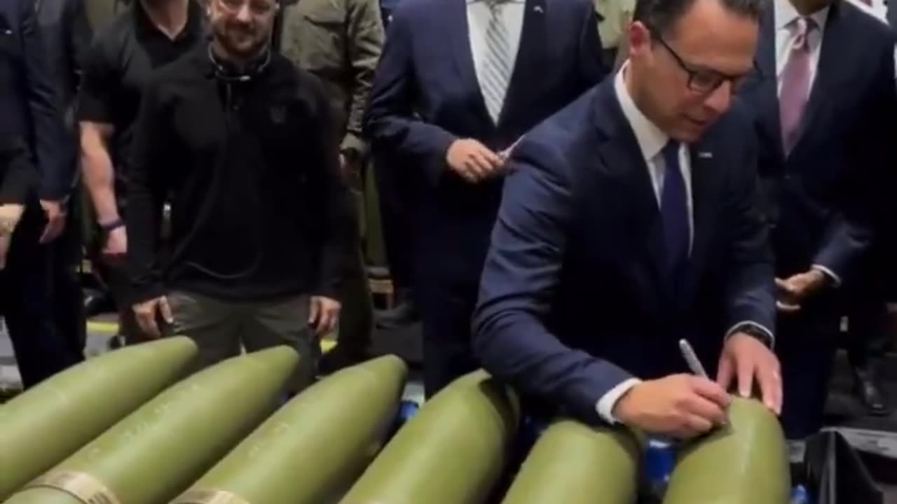 Ukraine politicians signing BOMBS to be dropped to kill civilians. SICK!