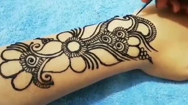 Beautiful floral henna tattoo with henna stain