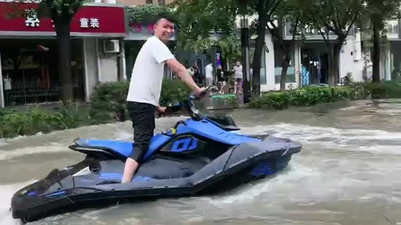 Jet Skiing Through Flooded Streets