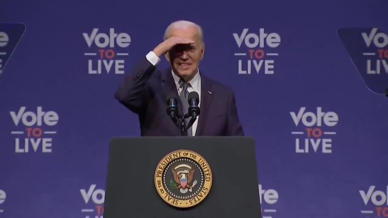 Biden gets cut off by the music, then wanders around...