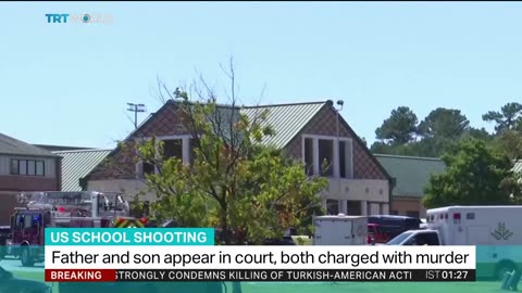 Father and son charged in Georgia school shooting