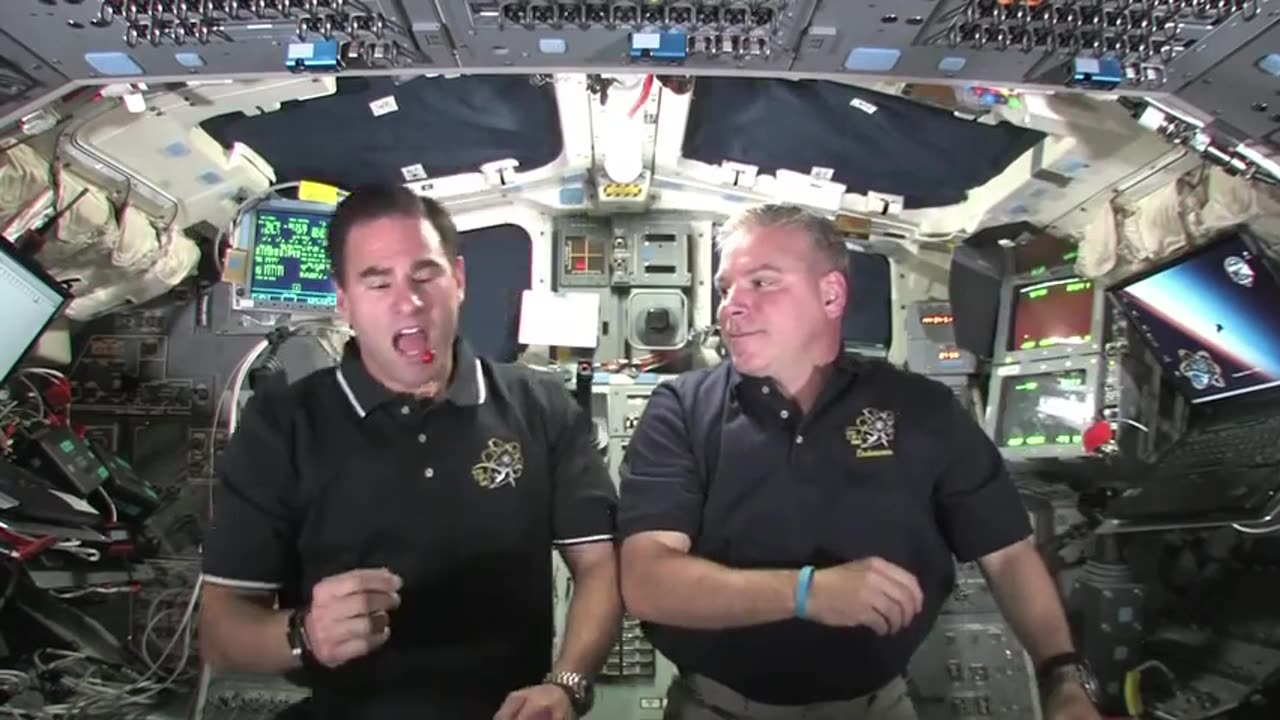 The Two Gregs- Quizzed On-Orbit