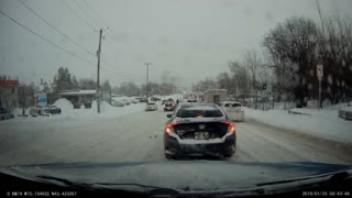 Cyclist Slips in a Snowstorm