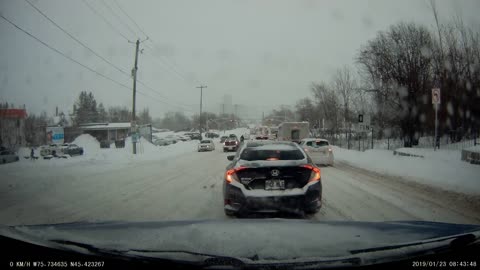 Cyclist Slips in a Snowstorm