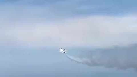 Military Aircraft Spraying Chemtrails Over Occupied Beach