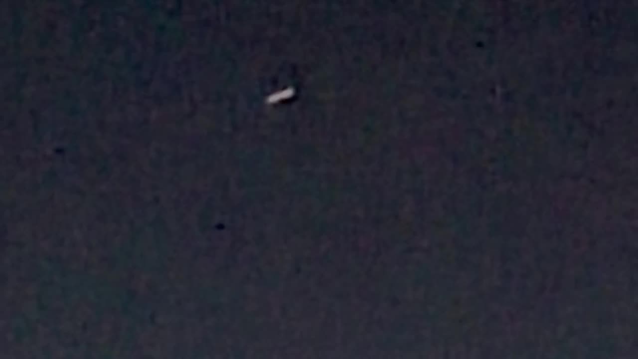 Strange cigar UFO (mothership?) spotted over my backyard 10/26/24 6:55p (1 of 3)