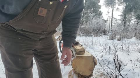 DIY chainsaw mill guide in use