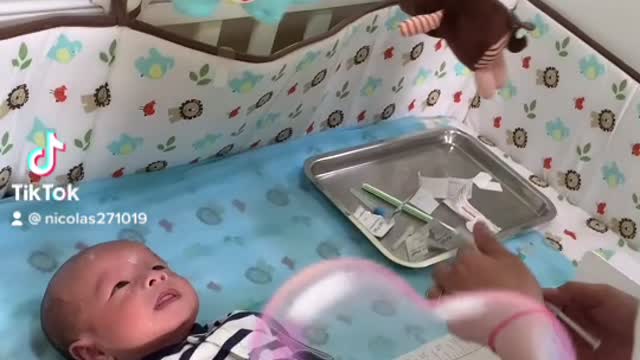 Video of baby son getting vaccinated