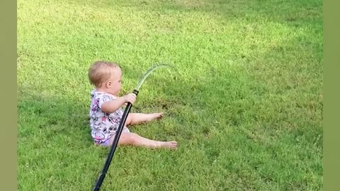 Funny Babies Playing With Water