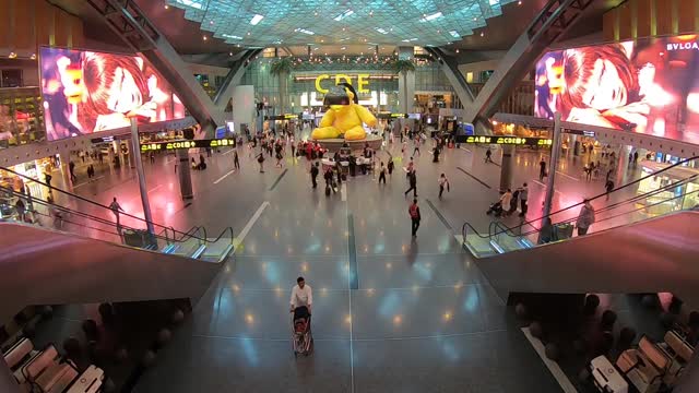 Hustling Passengers In An Airport In Time Lapse Mode