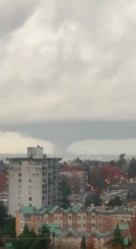 Looks like a large waterspout has started to appear outside Vancouver airport, Canada.