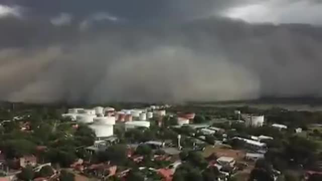 Dust and Smoke Storm arriving in Villa Elisa, Paraguay.