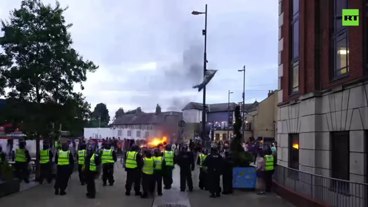 Enraged protesters set police car ablaze in Sunderland, UK