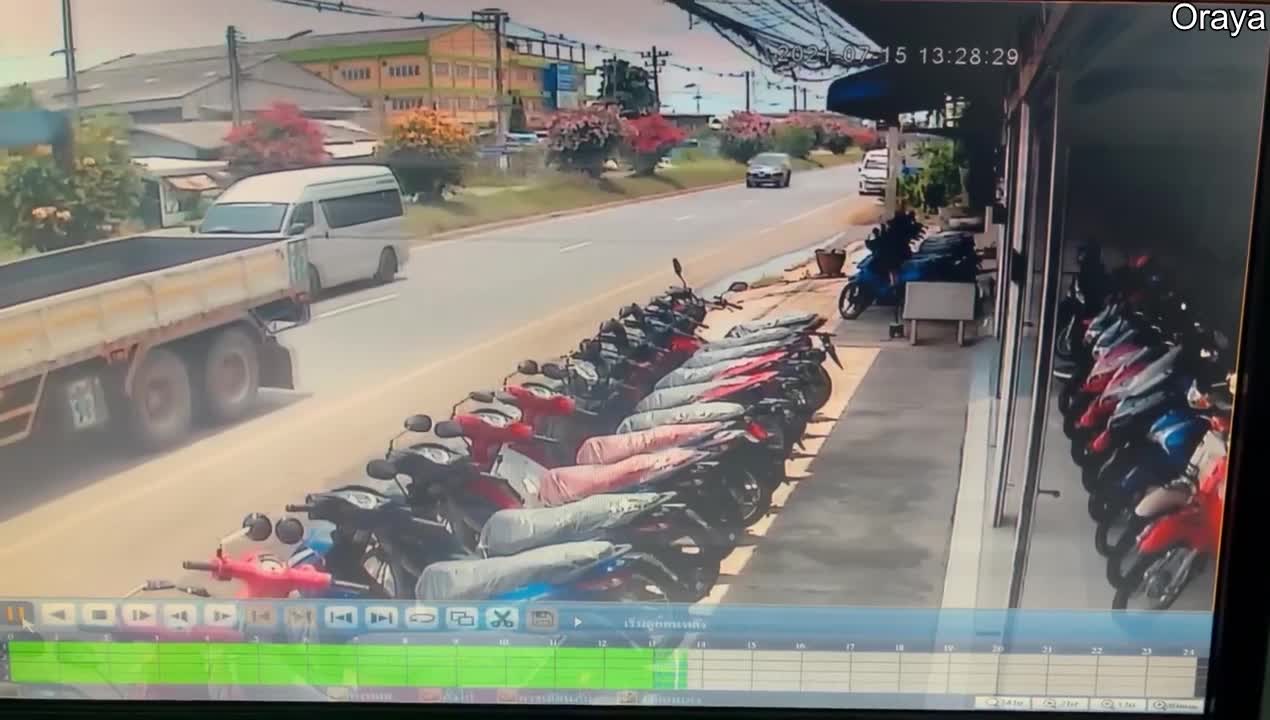 Traffic Cone Sign Protects Mopeds From Water Tank