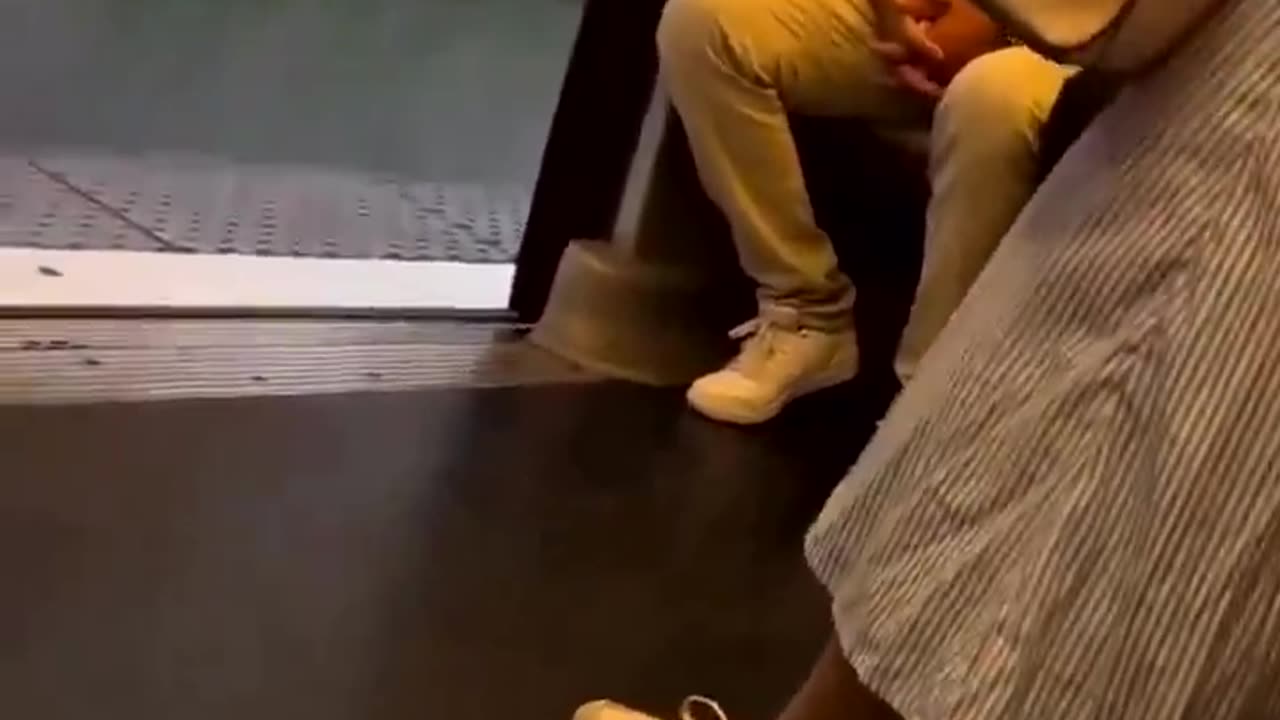 An antisemitic man harassing a Jewish family on the subway in Paris.