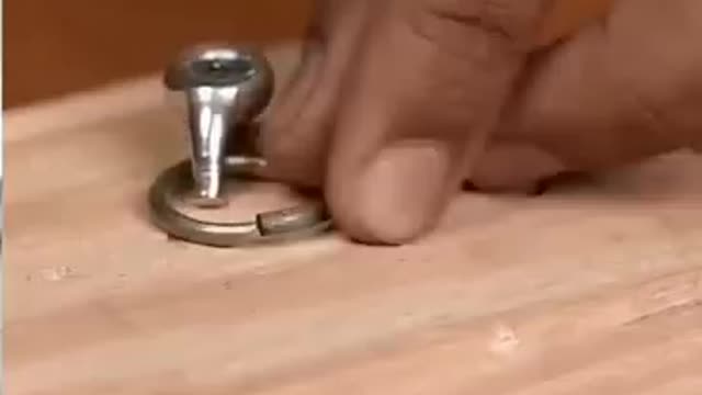 How do you attach a chain to a piece of wood