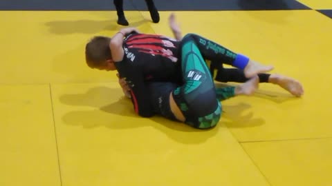 Girl grapples boy