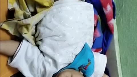 Funny baby with funny exprrssion